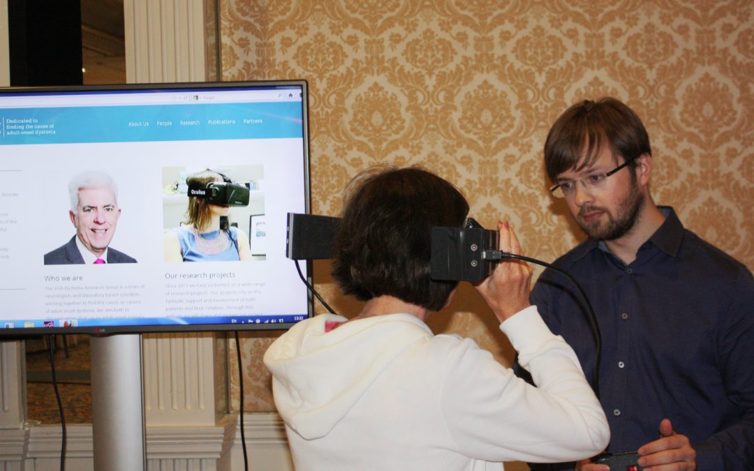 Attendee trials a TDT headset at the Dystonia Ireland Conference: Meet the Experts